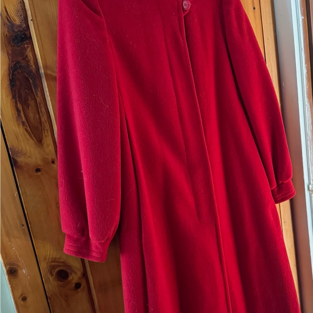 Vintage gorgeous red wool coat. Hidden buttons. Made in New York. Fully lined.